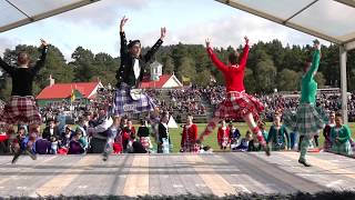 Competitors in the Hullachan Scottish Highland Dance during the 2019 Braemar Gathering in Scotland [upl. by Ayotas]