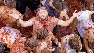 La Tomatina  Festival Discoveries  World Nomads [upl. by Lux752]